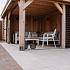 Overkapping met shutters en glazen schuifwand